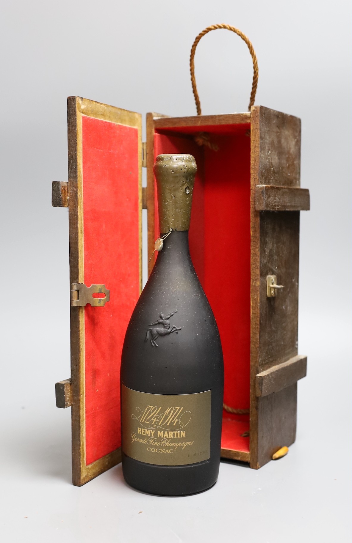 A bottle of Remy Martin 1724-1974 Grande Fine Champagne Cognac, bottle no.5368